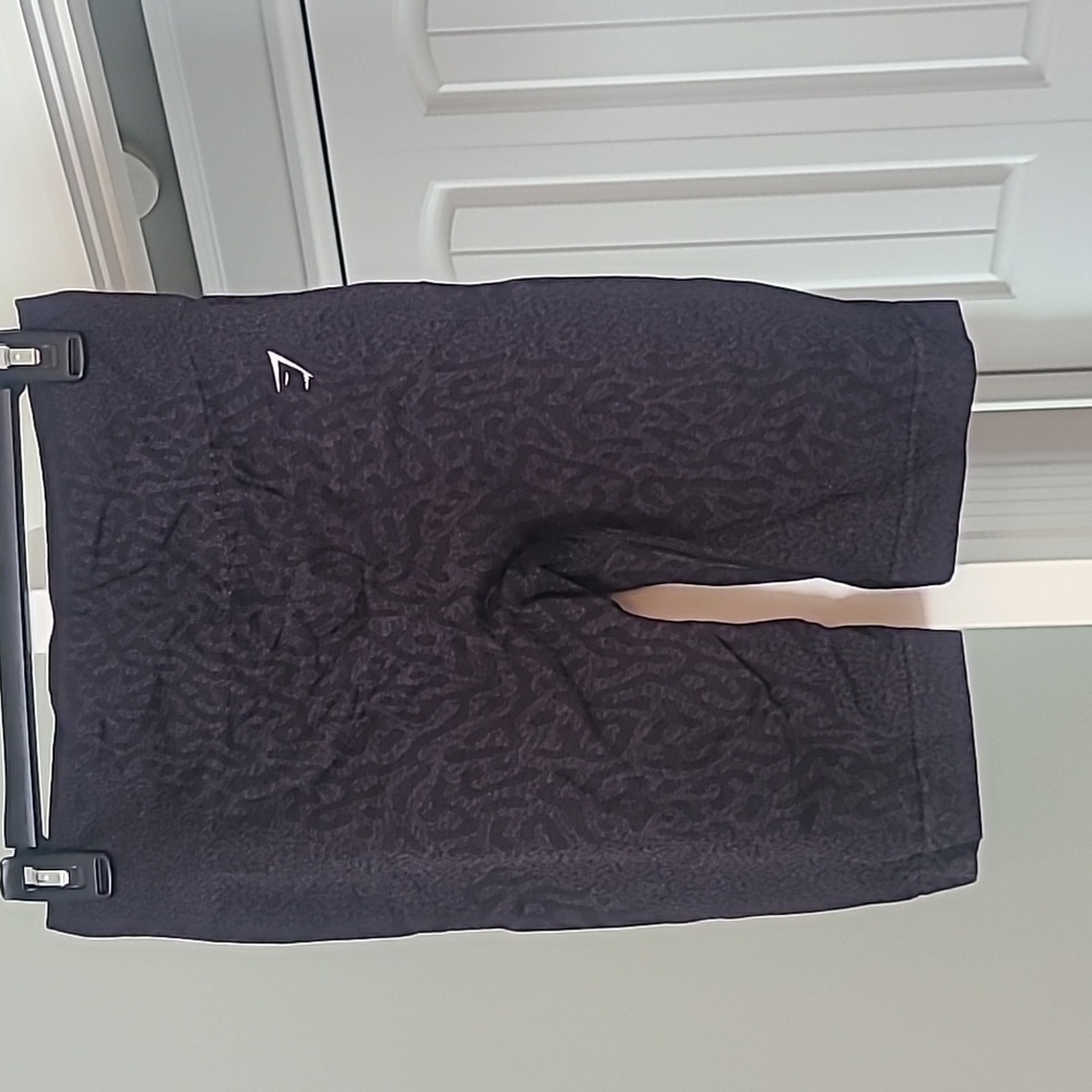 Gymshark black biker shorts, size large.